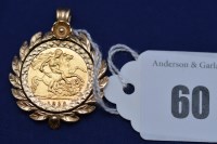 Lot 60 - An Elizabeth II half sovereign, 1982, in 9ct....