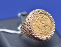 Lot 66 - A George V gold half sovereign, 1914, in 9ct....