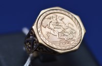 Lot 75 - A yellow metal and 9ct. yellow gold ring, the...