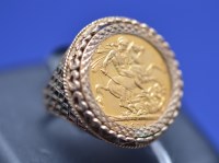 Lot 100 - A George V gold sovereign, 1913, in 9ct....