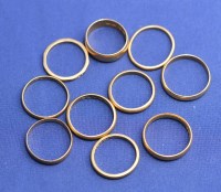 Lot 159 - Ten 22ct. yellow gold wedding bands, one of...
