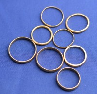 Lot 160 - Eight 22ct. yellow gold wedding bands, all...