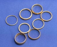 Lot 162 - Eight 22ct. yellow gold wedding bands, one...