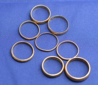 Lot 168 - eight 22ct. yellow gold wedding bands, one...
