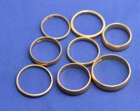 Lot 172 - Eight 22ct. yellow gold wedding bands, all...