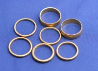 Lot 179 - Seven 22ct. yellow gold wedding bands, all...