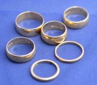 Lot 192 - Six 18ct. yellow gold wedding bands, various...