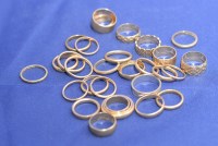 Lot 195 - A quantity of 9ct. yellow and white gold...