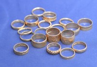 Lot 212 - A quantity of 9ct. yellow gold wedding bands,...