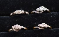 Lot 227 - Four three-stone diamond rings on 18ct. yellow...