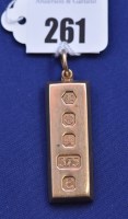 Lot 261 - A 9ct. yellow gold ingot pendant, 31grms.