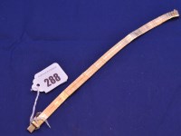 Lot 288 - An 18ct. yellow gold bracelet, of textured...