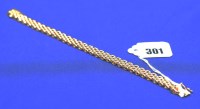 Lot 301 - A 9ct. yellow gold bracelet, of oval links,...
