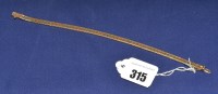 Lot 315 - A 9ct. yellow white and rose gold bracelet, of...