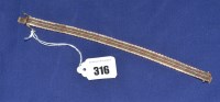 Lot 316 - A 9ct. yellow and rose gold bracelet of...