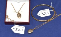 Lot 321 - Two 9ct. yellow gold locket pendants with...