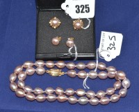 Lot 325 - A pair of champagne cultured pearl and diamond...