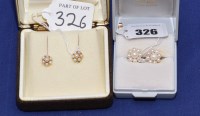 Lot 326 - Two pairs of cultured pearl stud earrings in...