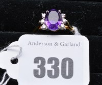 Lot 330 - An amethyst and diamond ring, the oval...