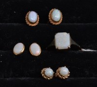 Lot 336 - A white opal ring in yellow metal mount...