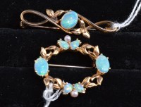 Lot 338 - Two opal and 9ct. yellow gold brooches, one...