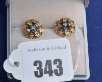 Lot 343 - A pair of sapphire, diamond and 9ct. yellow...