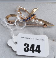 Lot 344 - A cultured pearl, sapphire and 9ct. yellow...