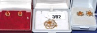 Lot 352 - A citrine, cultured pearl and 9ct. yellow gold...