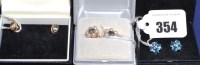 Lot 354 - A pair of diamond and blue topaz cluster stud...