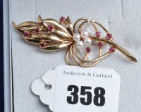 Lot 358 - A 9ct. yellow gold brooch, set cultured pearls...