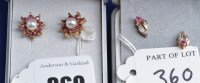 Lot 360 - A pair of 9ct. yellow gold, ruby and diamond...