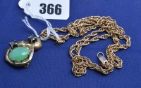 Lot 366 - A yellow metal ingot set star sapphires and...