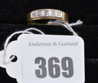 Lot 369 - A five stone diamond ring in white metal mount...