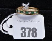 Lot 378 - An emerald and diamond ring, the five...