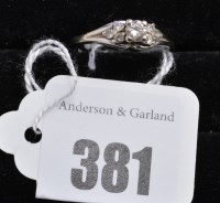 Lot 381 - A diamond ring, the central brilliant-cut...