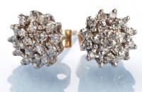 Lot 390 - A pair of diamond cluster stud earrings,...