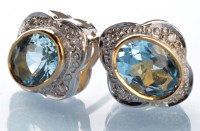 Lot 392 - A pair of aquamarine and diamond cluster stud...