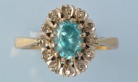 Lot 399 - A zircon and diamond ring, the oval facet cut...