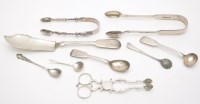 Lot 722 - A pair of early George III sugar tongs, by...