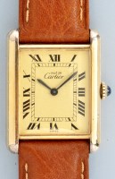 Lot 812 - Must de Cartier: a lady's silver gilt tank...