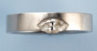 Lot 841 - A diamond ring, the marquise cut diamond edge...