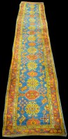 Lot 957 - A Ushak runner, with medallions on blue ground,...