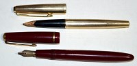 Lot 44 - A Parker 585 fountain pen in maroon plastic...