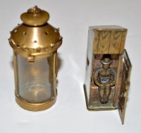 Lot 58 - An Edwardian brass vesta case in the form of...