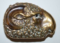 Lot 73 - An Edwardian brass vesta case in the form of a...