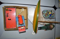 Lot 267 - A West-German tinplate tractor and trailer,...