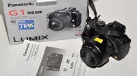 Lot 387 - A Panasonic Lumix DMC-G1K digital reflex...