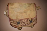 Lot 1109 - A rubberized imitation leather trimmed...