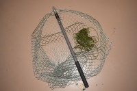 Lot 1115 - A modern folding landing net.