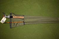 Lot 1180 - An unnamed three-piece approximately 9 1/2ft....